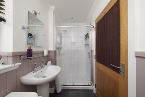 Shower, eco-friendly toiletries, hair dryer, towels