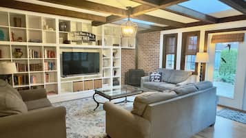 Smart TV, fireplace, books