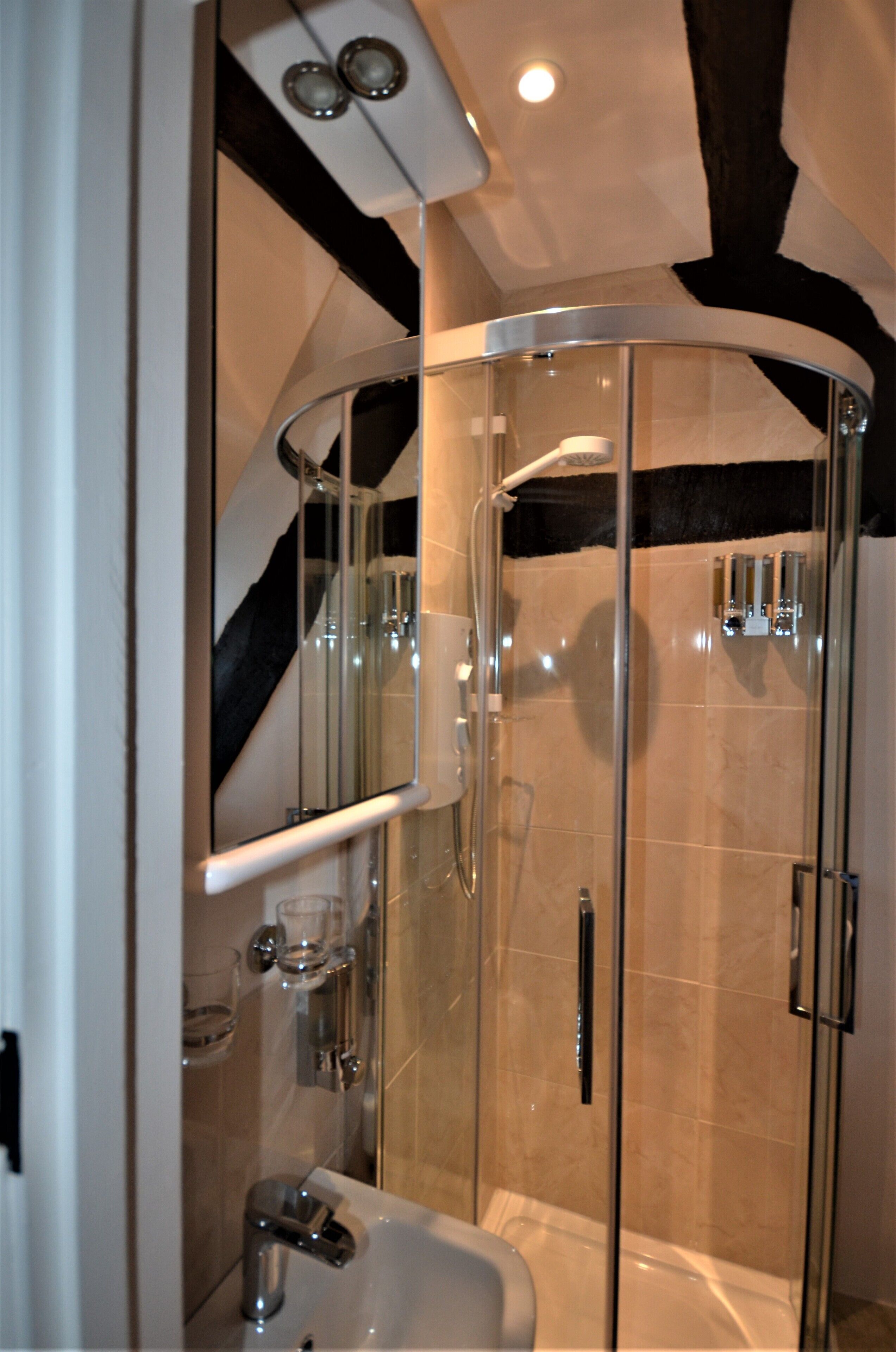 Combined shower/bathtub, hair dryer, towels, soap