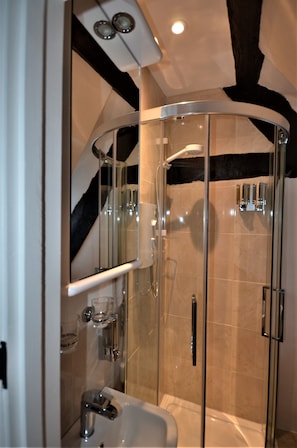 Combined shower/tub, hair dryer, towels, soap