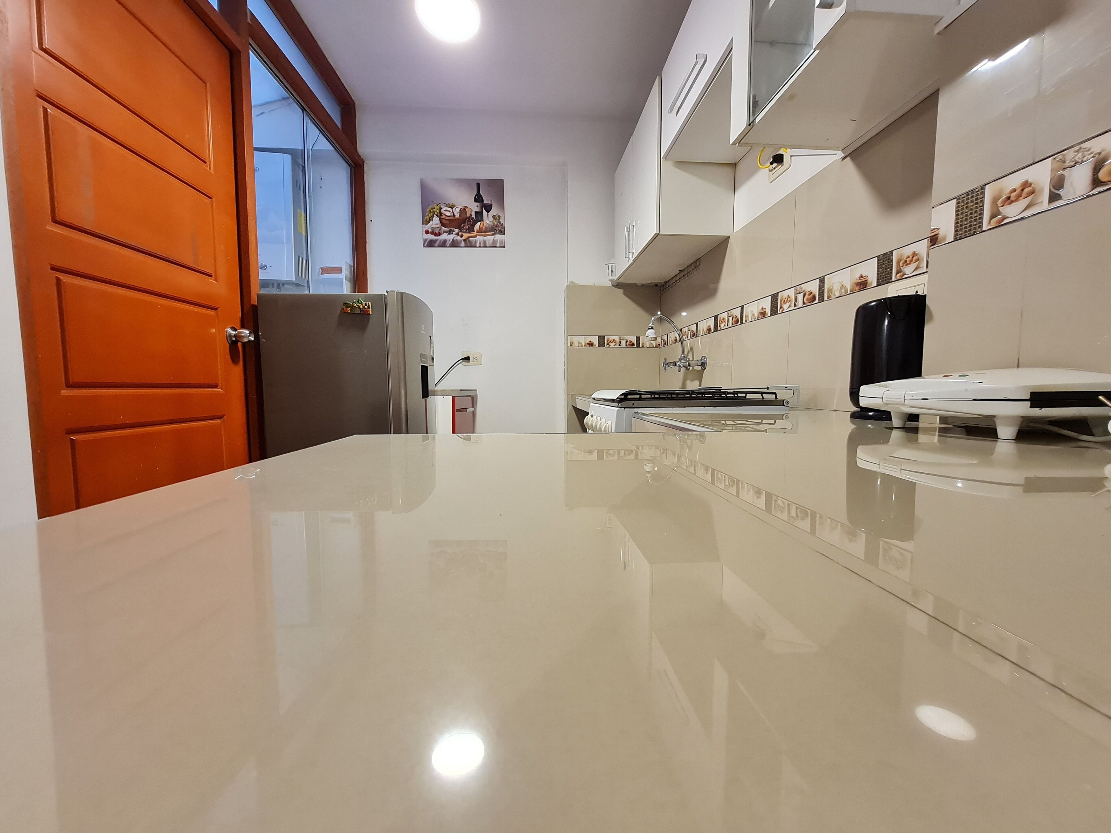 Comfort Apartment | Private kitchen | Microwave, stovetop, electric kettle, griddle