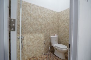 Standard Double Room | Bathroom | Shower, towels - OYO 945 Mega Kost 2 (Palembang)