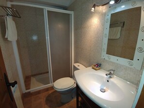 Hair dryer, towels, soap, shampoo