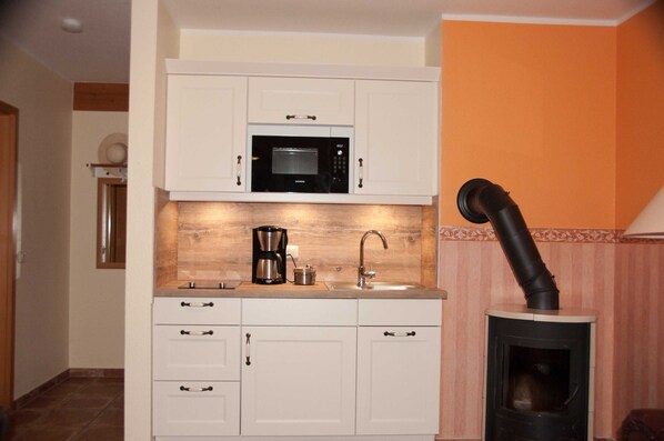 Imagen sin descripción, 1 de 16, botón