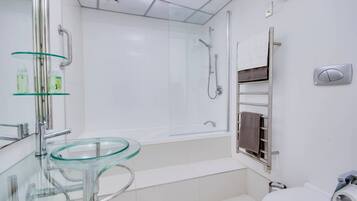 Apartment, 2 Bedrooms | Bathroom | Combined shower/tub, deep soaking tub, free toiletries, hair dryer