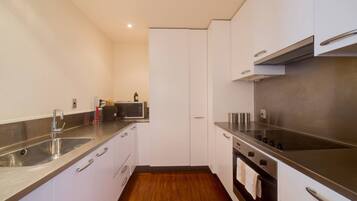 Apartment, 2 Bedrooms | Private kitchen | Full-sized fridge, microwave, oven, stovetop