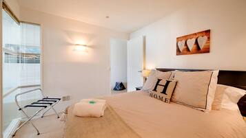 Apartemen, 2 kamar tidur | 2 kamar tidur, setrika/meja setrika, Wi-Fi gratis, dan seprai linen