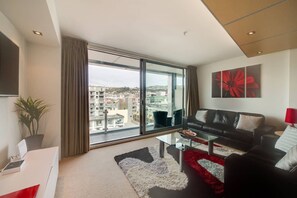 Apartamento, 2 quartos | Área de estar