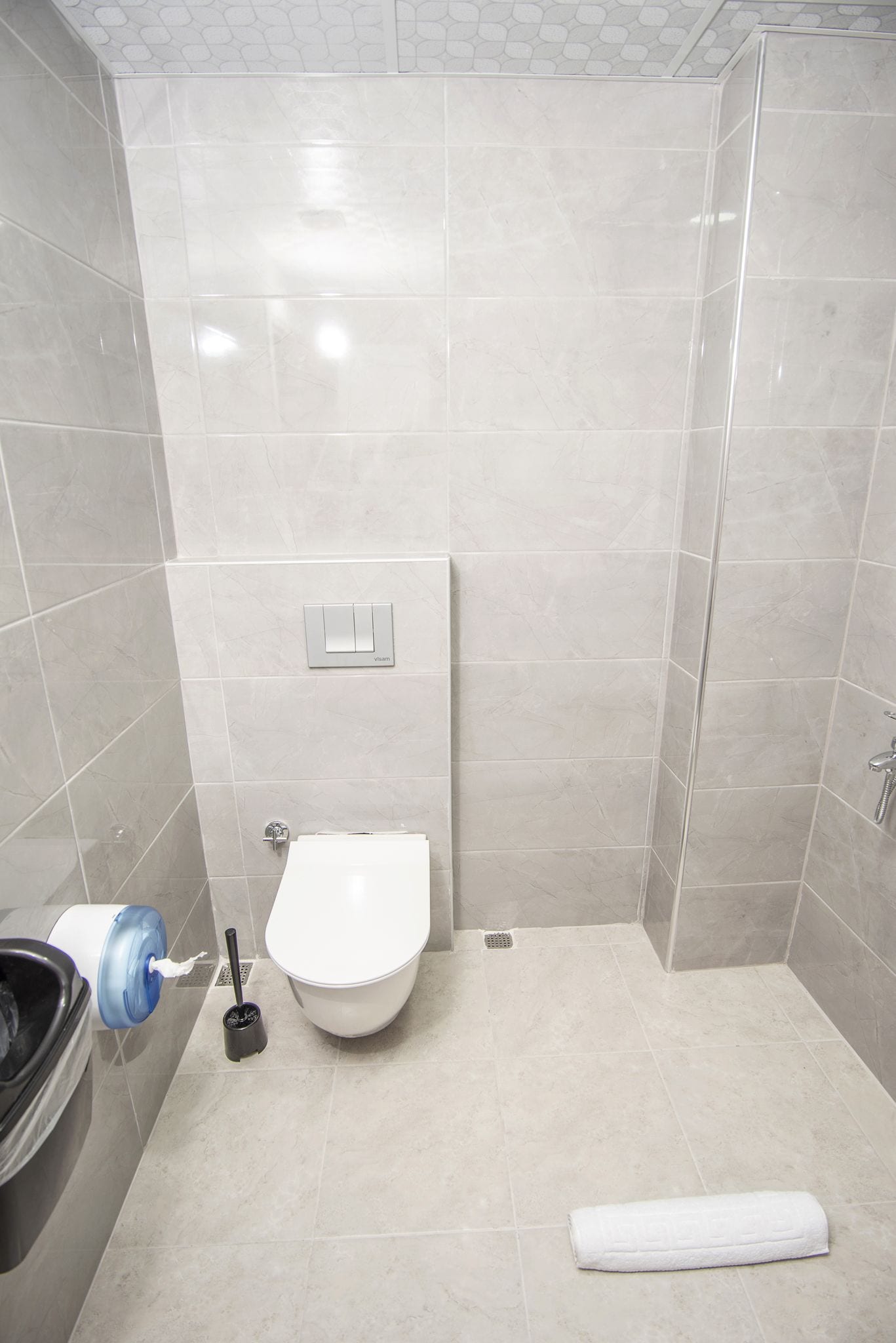 shower, hair dryer, bathrobes, slippers