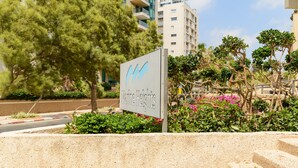 Front of property - 3BR Apt Steps from Sea W Parking (Herzliya)