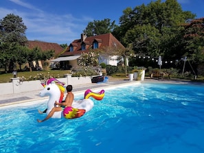 Outdoor pool, pool umbrellas, pool loungers