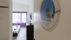 Deluxe Double Room (EMBUDU) | Living area | Heated floors - BeachIN (Ins)
