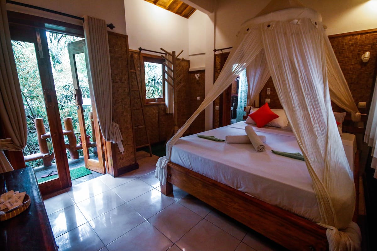 Suite Deluxe | 1 dormitorio, escritorio, wifi gratis y ropa de cama