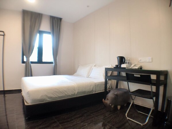 Deluxe tweepersoonskamer | Luxe beddengoed, een bureau, gratis wifi, beddengoed