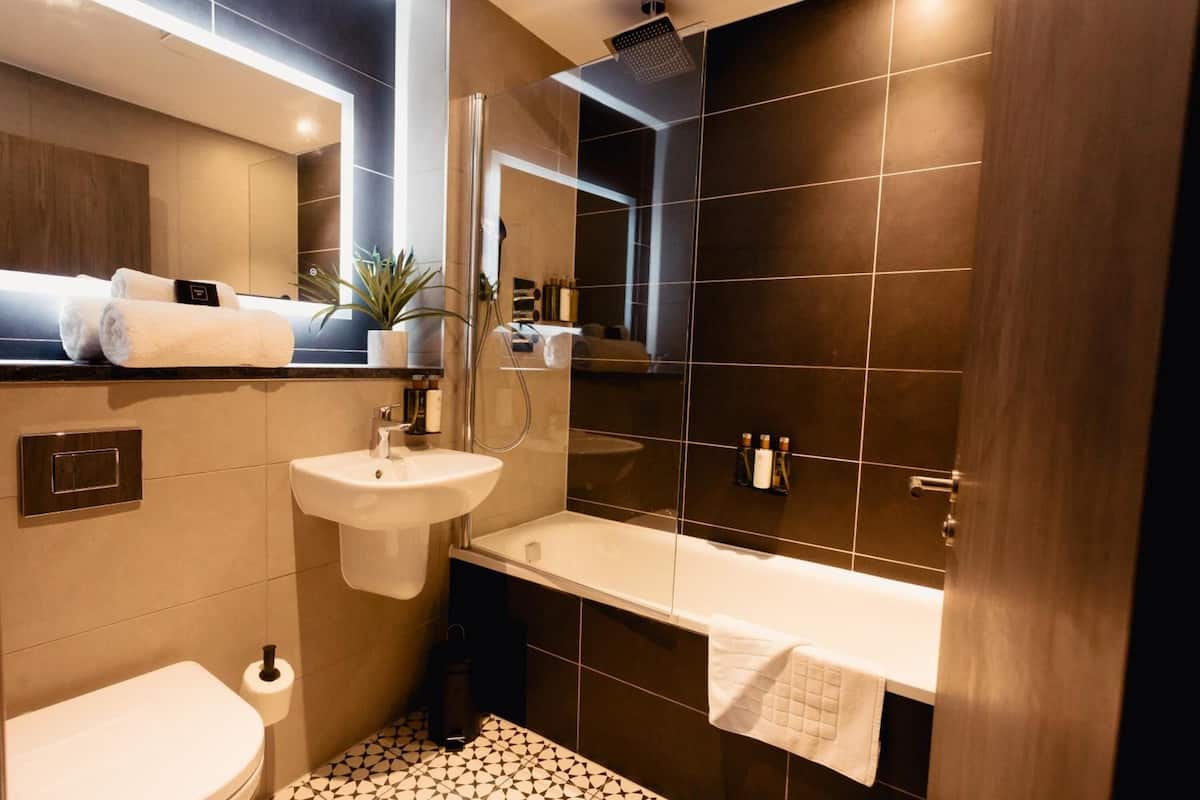 junior double room | bathroom | designer toiletries, hair dryer, towels, soap