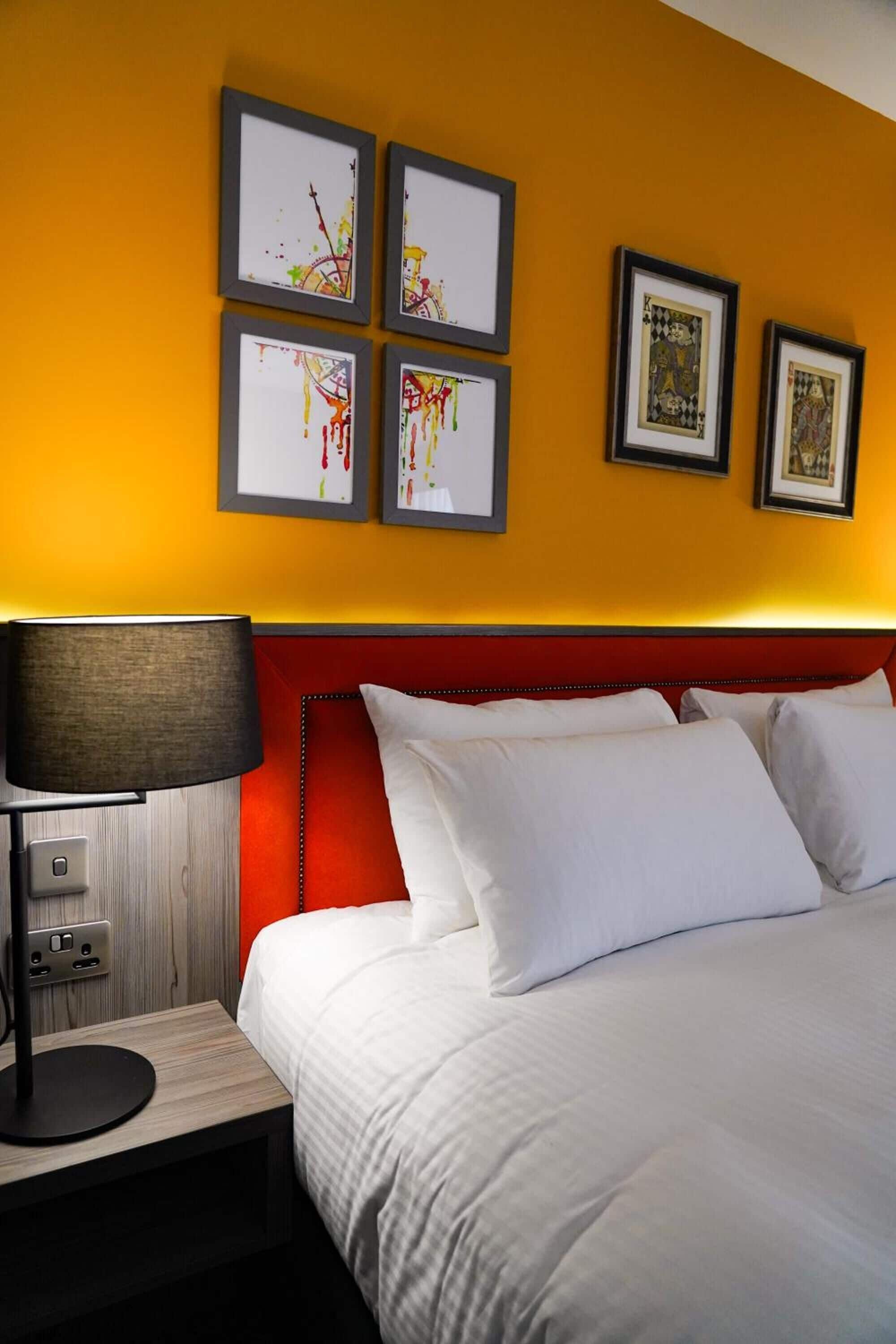 deluxe double room | in-room safe, individually decorated, desk, laptop workspace