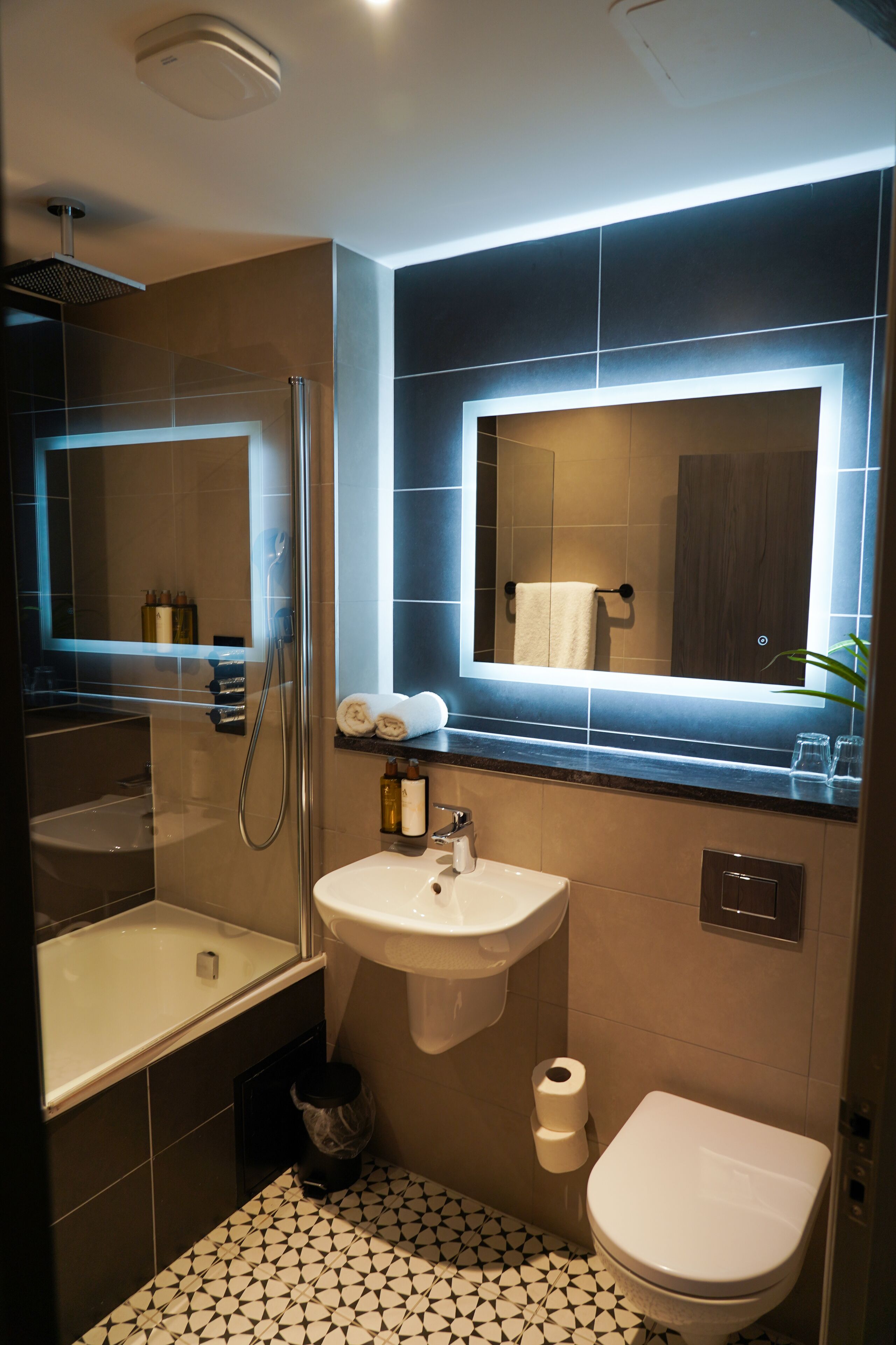 junior double room | bathroom | designer toiletries, hair dryer, towels, soap