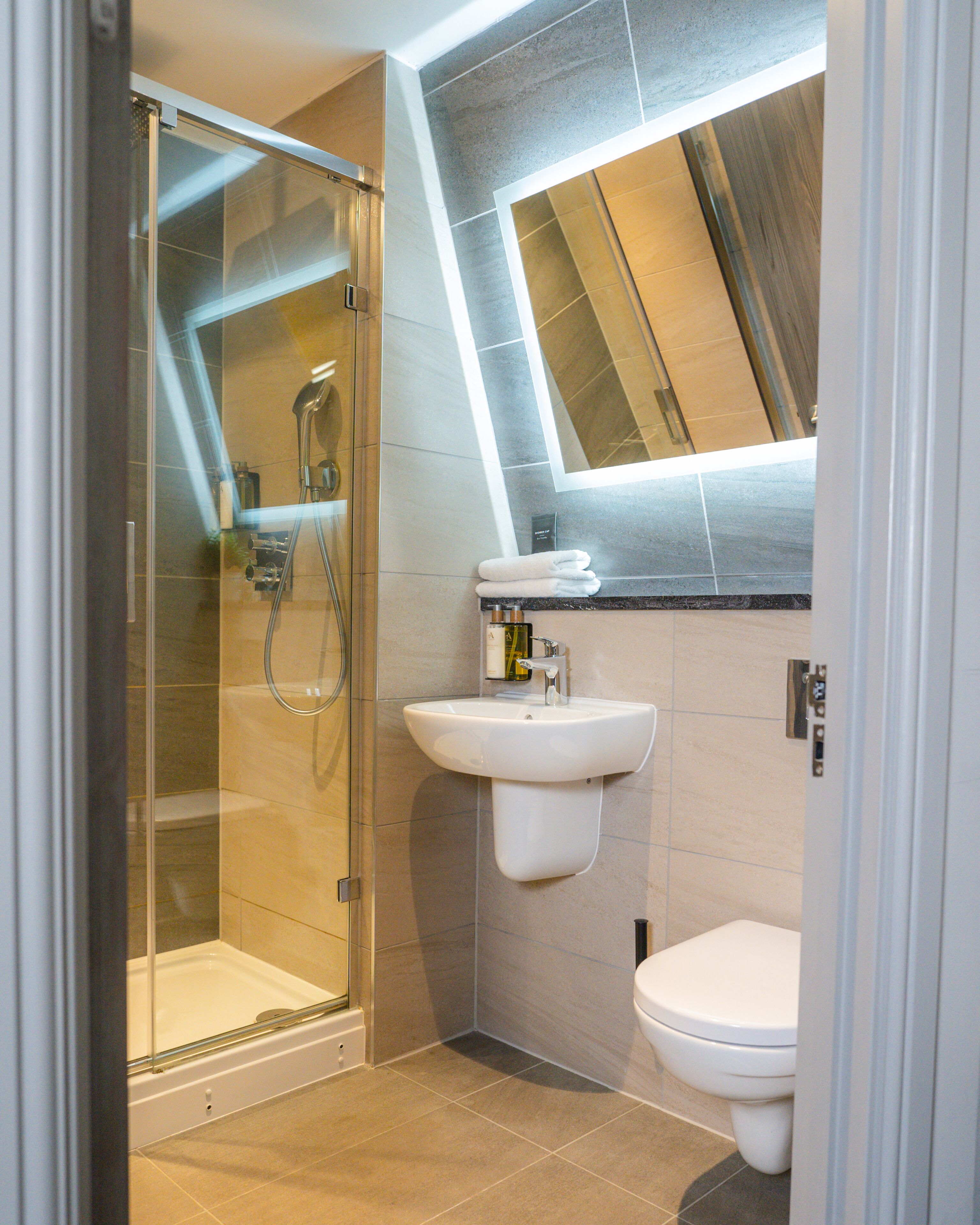 standard double room | bathroom | designer toiletries, hair dryer, towels, soap