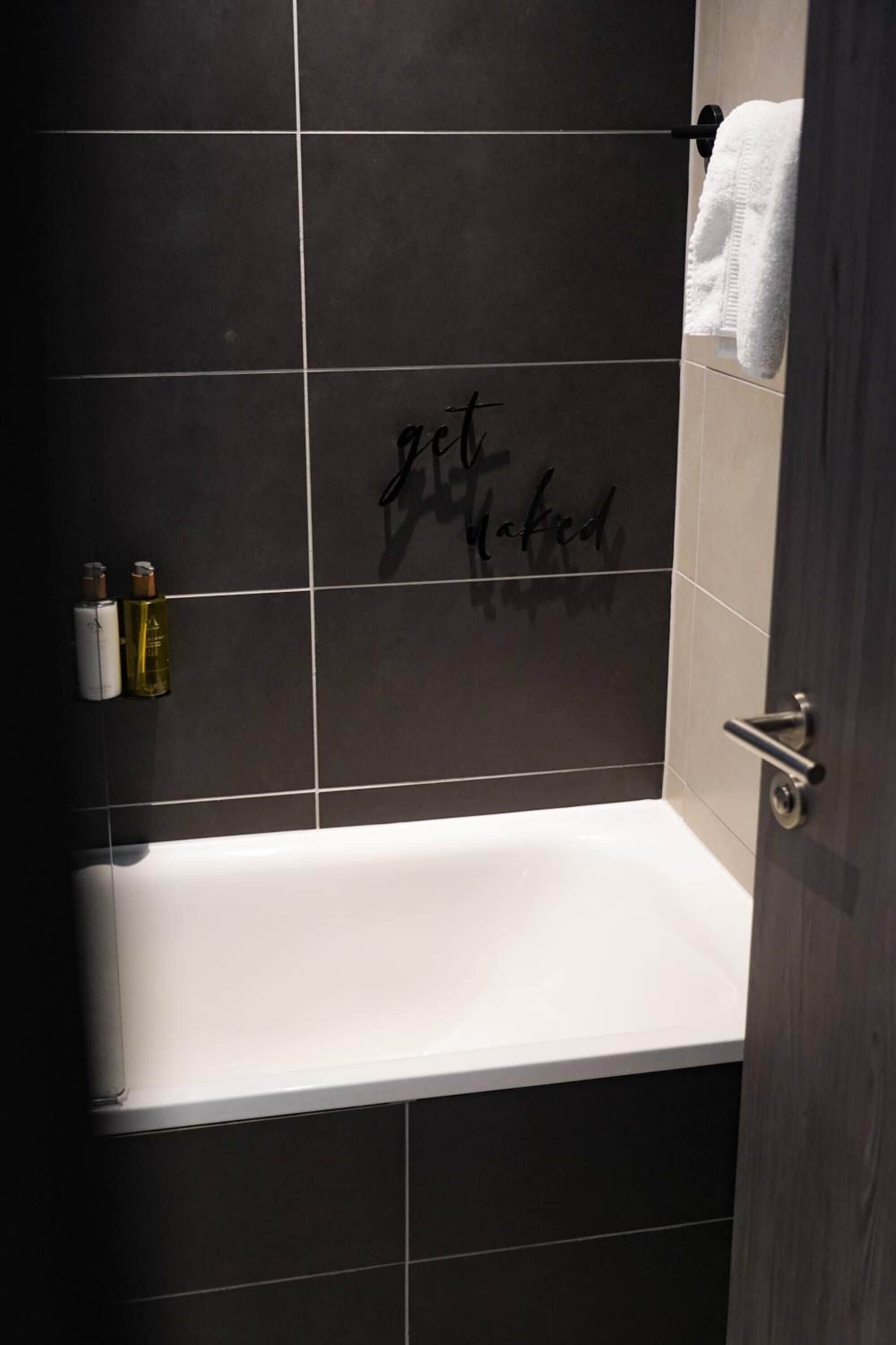 junior double room | bathroom | designer toiletries, hair dryer, towels, soap