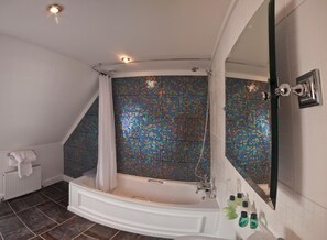 Designer toiletries, towels, soap, toilet paper