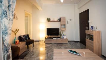 Leilighet, 1 soverom | Oppholdsområde | Flatskjerm-TV og DVD-spiller