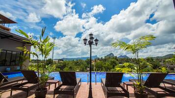 Outdoor pool, open 10:00 AM to 8:00 PM, sun loungers