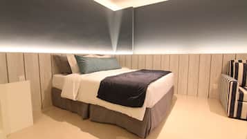 Habitación cuádruple de lujo | 1 dormitorio, minibar, caja fuerte