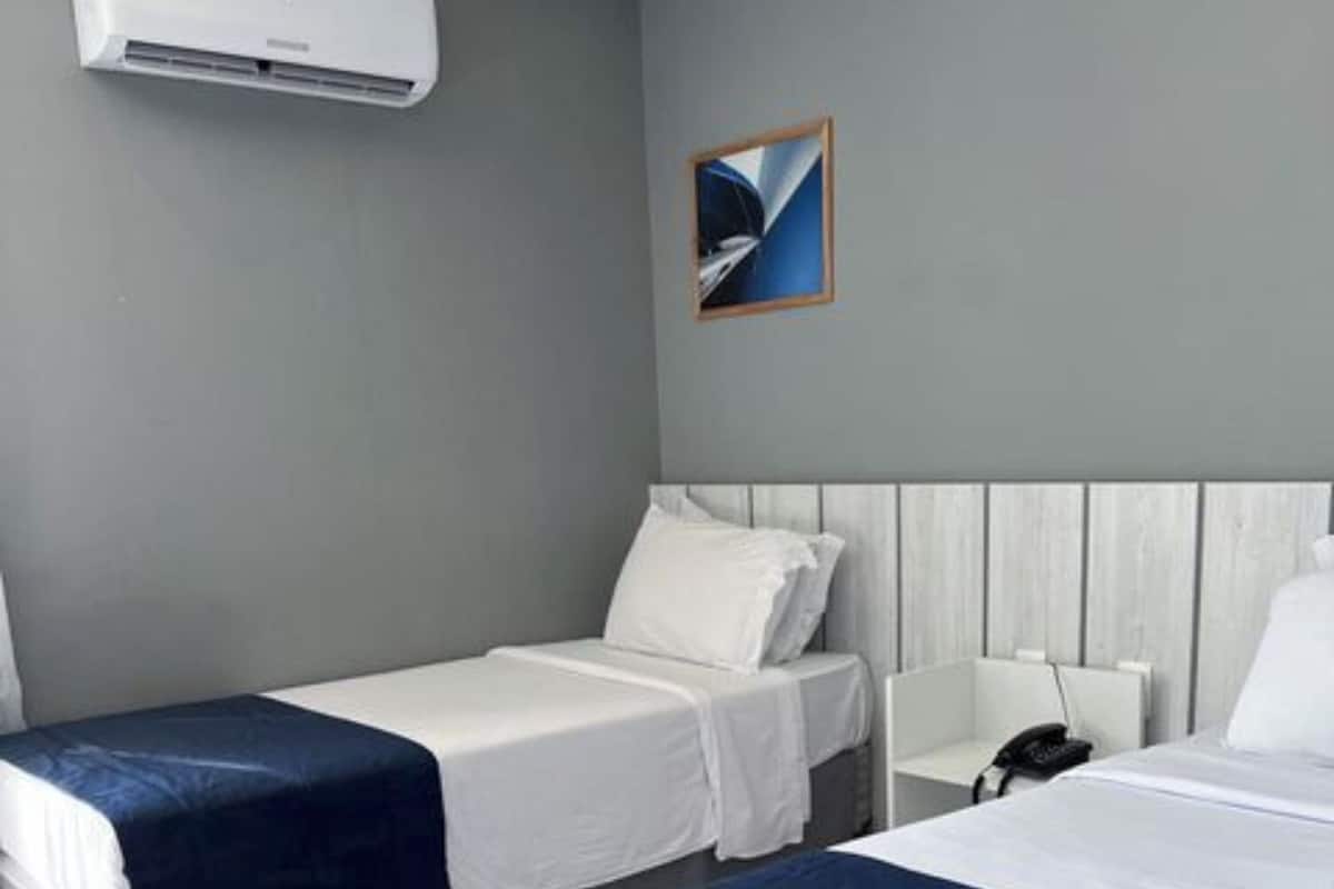 Standard Room, 2 Twin Beds | Minibar, in-room safe, laptop workspace, blackout drapes