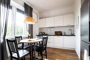 Appartement Supérieur | Cuisine privée | Réfrigérateur, plaque de cuisson, machine à expresso