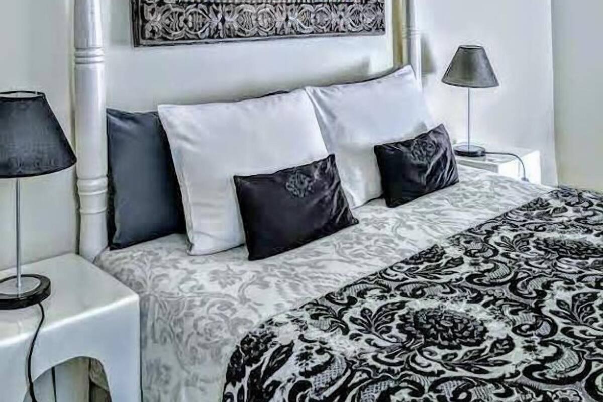 Double Room (Blanche) | Desk, blackout drapes, iron/ironing board (on request), WiFi (free)