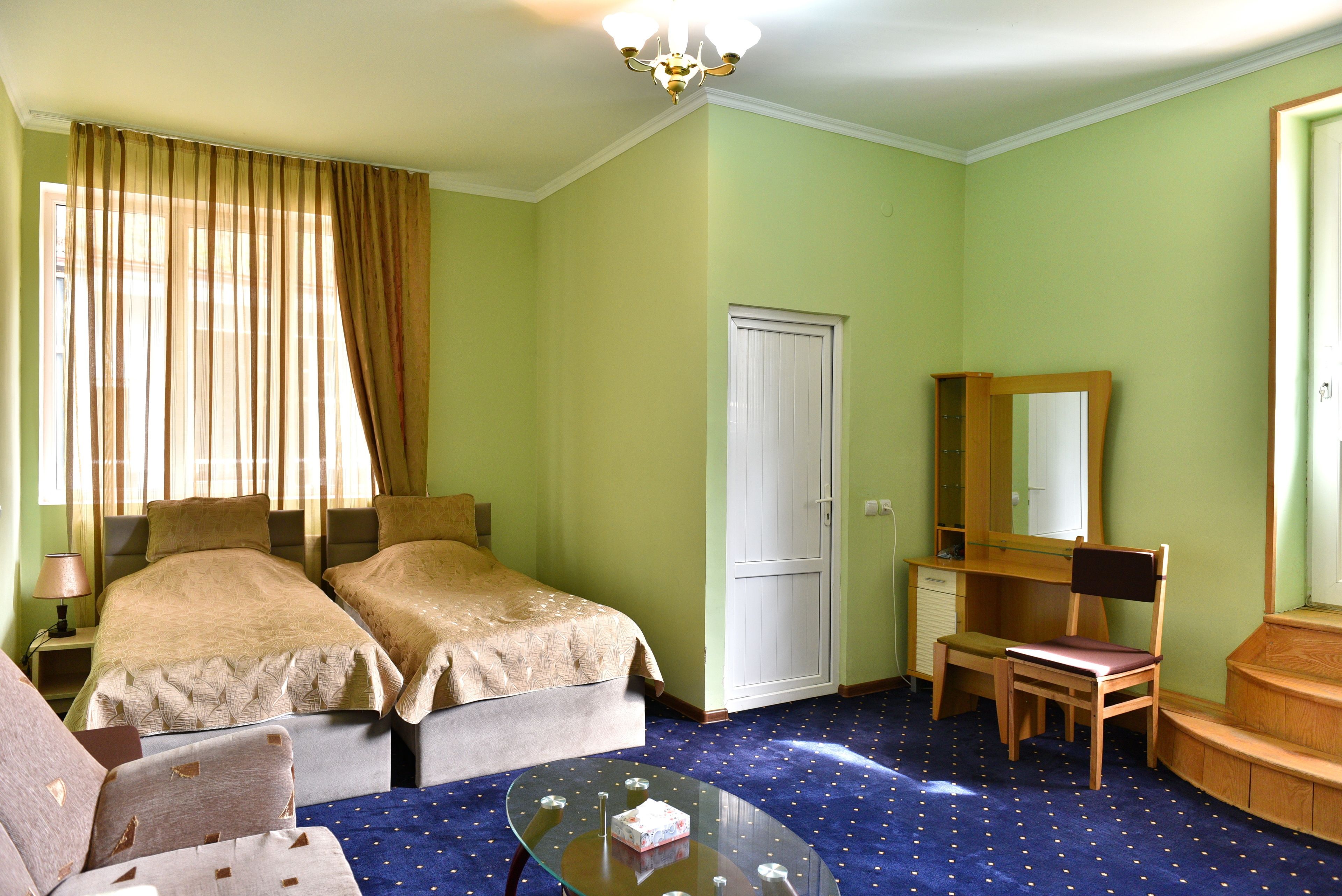 Superior kamer, 1 twee- of 2 eenpersoonsbedden | Een bureau, een strijkplank/strijkijzer, extra bedden (toeslag)