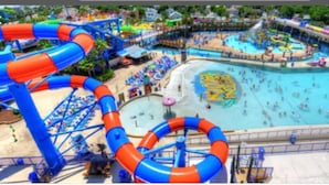 A water park with multiple slides and pools. - OCEANFRONT NEAR THE PIER!OCEAN VIEW FROM EVERY ROOM! 2-2 WRAPAROUND BALCONY! (Daytona Beach)