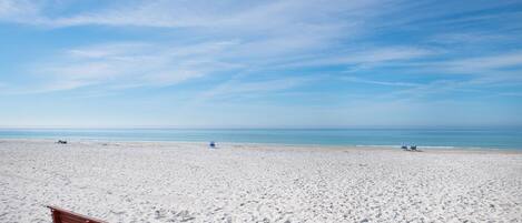 On the beach, sun-loungers, beach towels