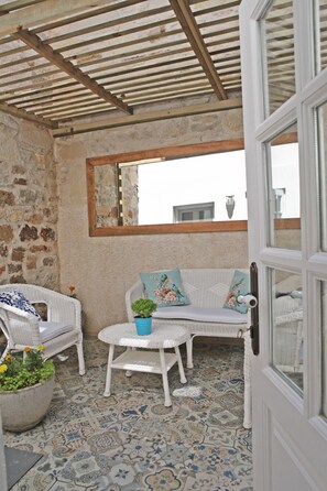 Deluxe Room, Garden Area (Basement/Ground Floor) | View from room - Evreka Butik Otel (Bozcaada)