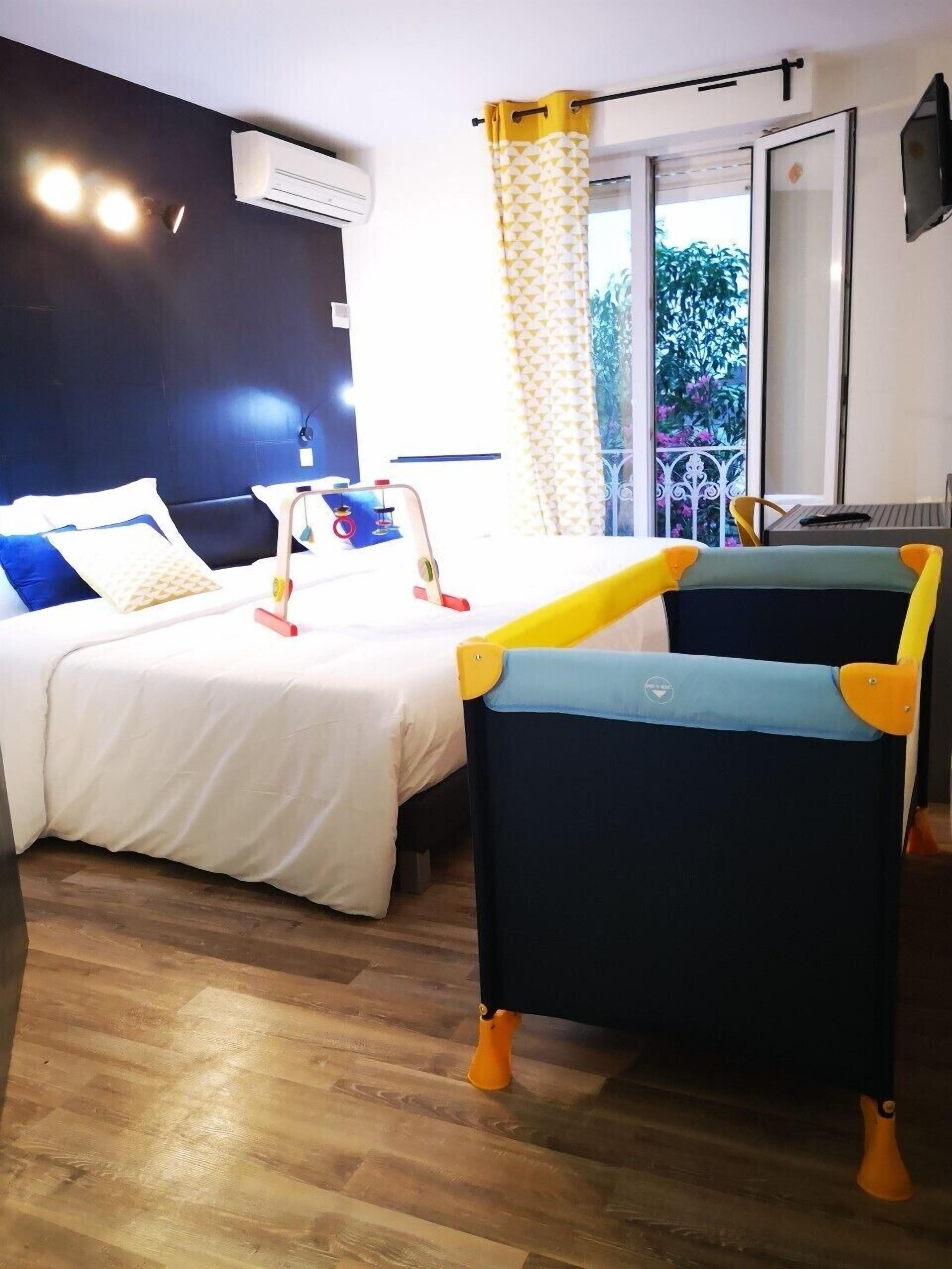 superior quadruple room | desk, blackout curtains, soundproofing, free cots/infant beds