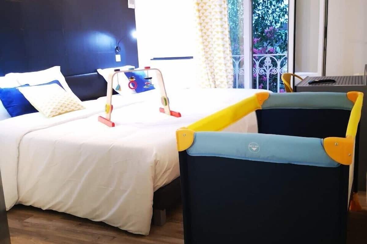 superior quadruple room | desk, blackout curtains, soundproofing, free cots/infant beds