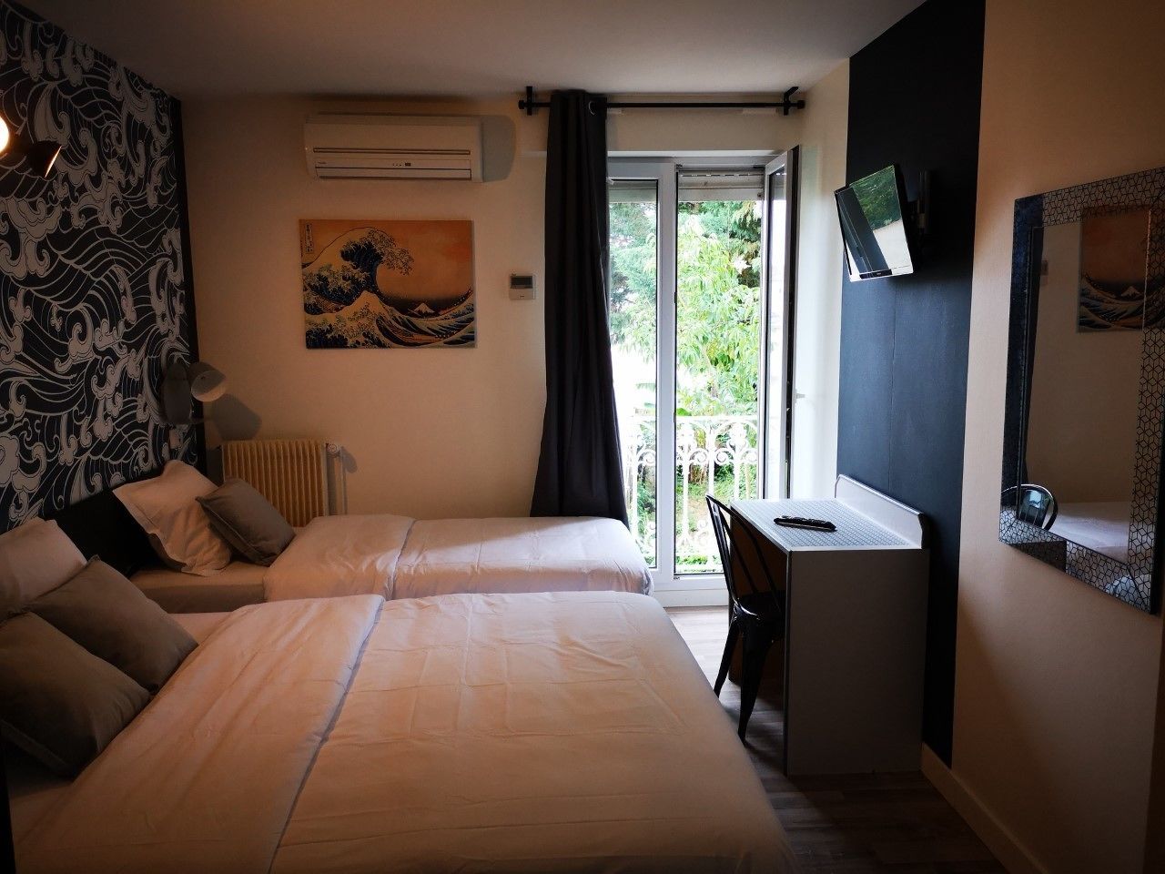 deluxe triple room | desk, blackout curtains, soundproofing, free cots/infant beds