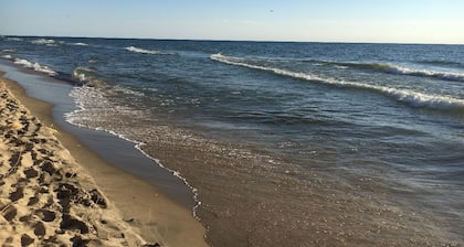 A block from the beach! A beautiful wooded spot a 5 minute walk from Lake MI..