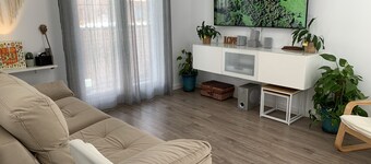 Beach and pine trees.