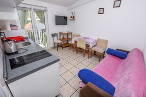 Apartment (A2) | Wohnzimmer | Fernseher