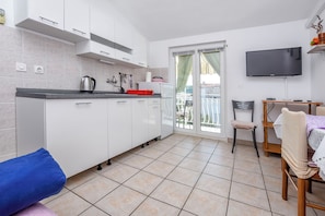Apartment (A2) | Private kitchen | Fridge, microwave, stovetop, espresso maker