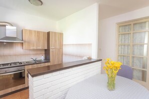 Apartment (A2) | Private kitchen | Fridge, oven, stovetop, electric kettle - Apartments Near Hangar Beach (Vodice)