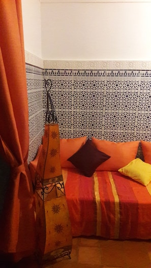 Relax in this inviting space with a comfortable bed and decorative accents.