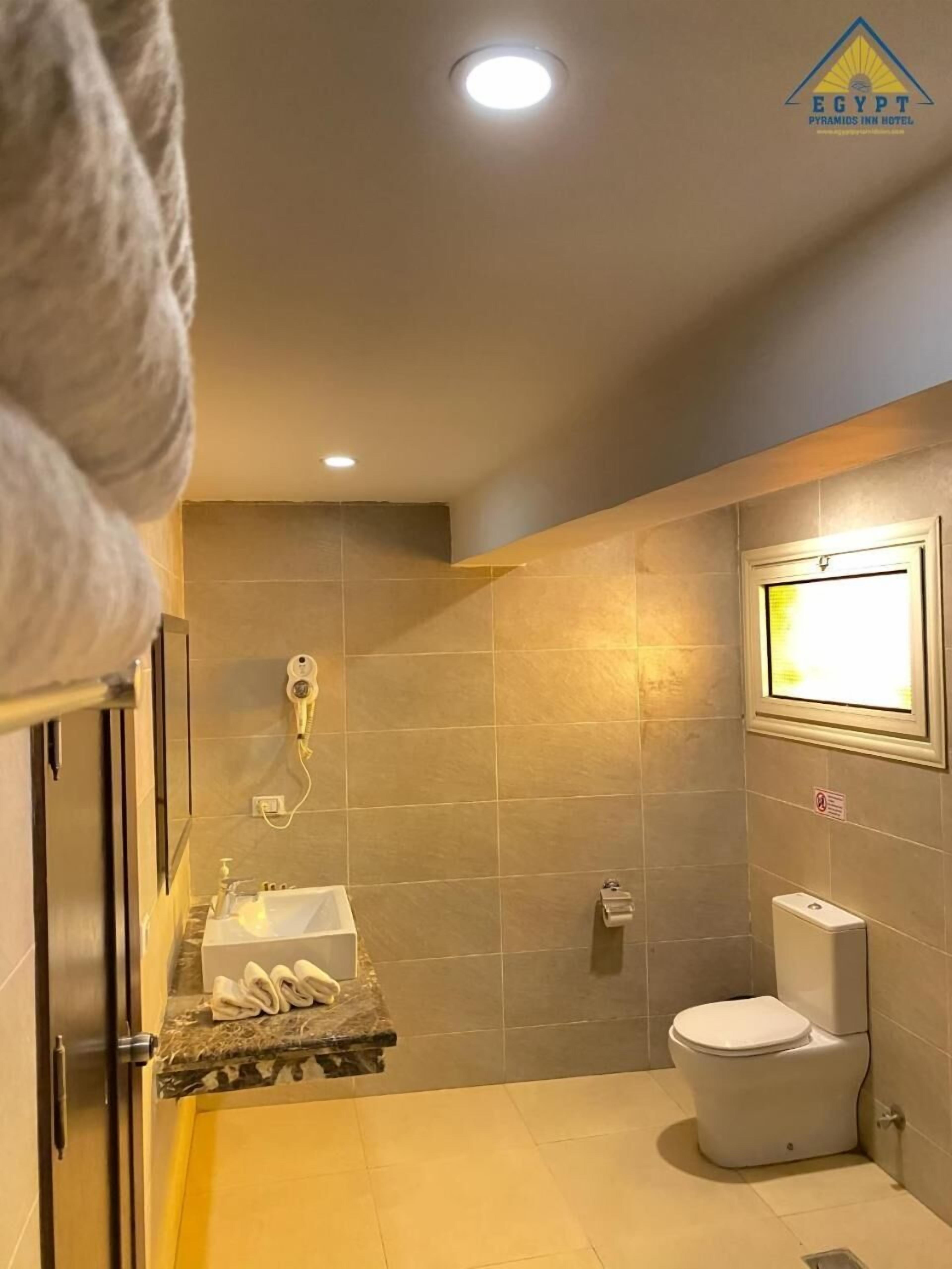 shower, free toiletries, slippers, bidet