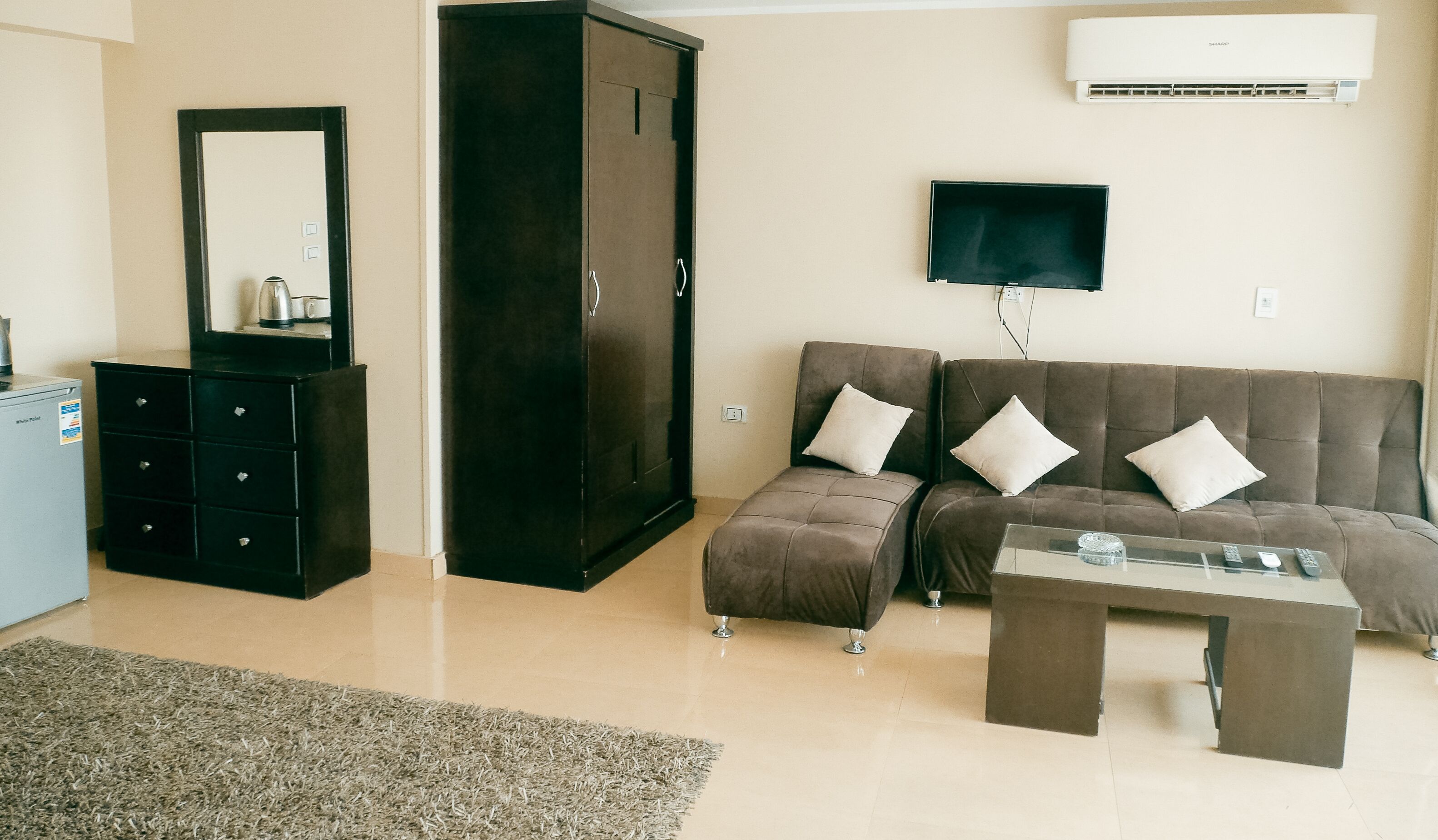 luxury room, multiple beds, non smoking, balcony | living area | flat-screen tv, fireplace