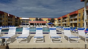 Outdoor pool, a heated pool - Ocean and Pool View Condo – Point East Condominium (New Smyrna Beach)