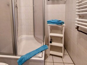 Shower, towels, soap, toilet paper