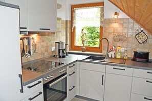 Fridge, oven, dishwasher, high chair