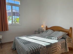 1 bedroom, travel cot, bed sheets