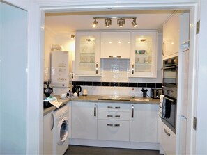 Private kitchen - Deck 2 -  a ground floor apartment with sea views that sleeps 4 guests  in 2 bedrooms (Sheringham)